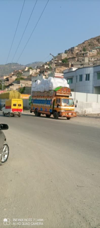 Mini Mazda Truck Transport service